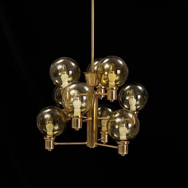 A 1960's brass and glass ceiling light.