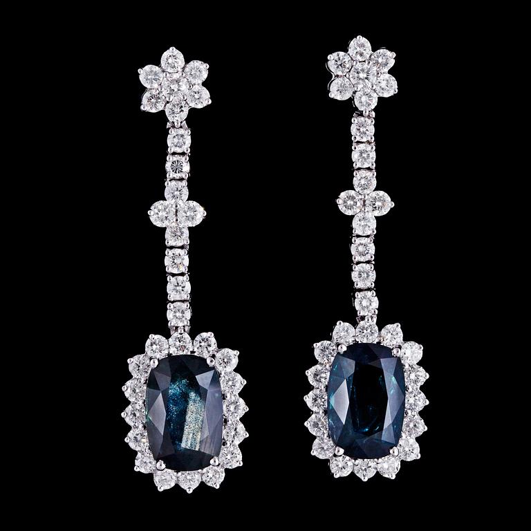 A pair of greenish-blue sapphire, 3.95 /3.93 cts and brilliant cut diamond earrings, tot. app. 2 cts.