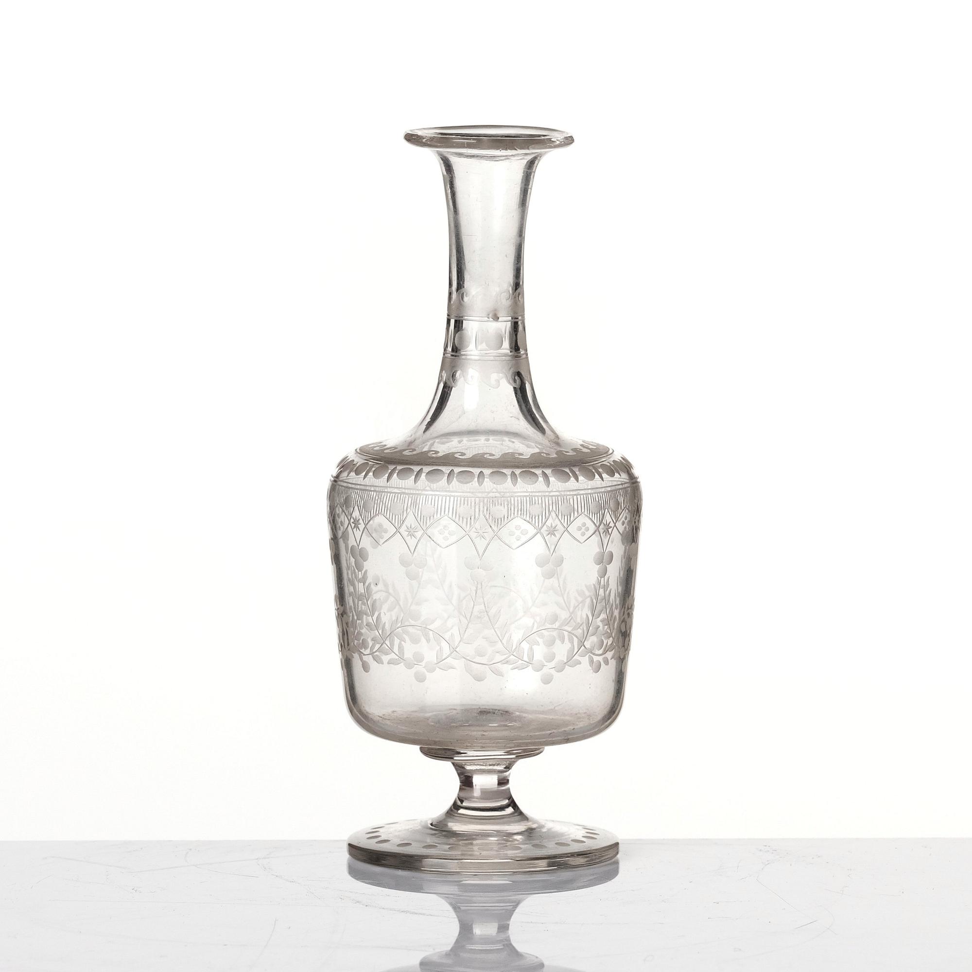 An engraved flask, circa 1800.