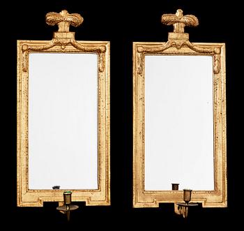 1260. A pair of Gustavian late 18th century one-light girandole mirrors.