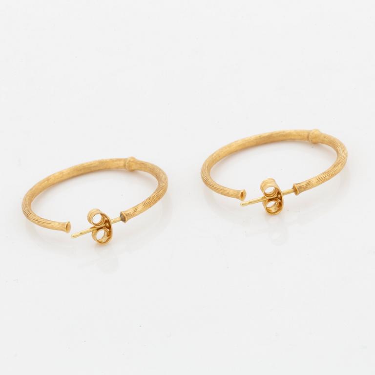 Ole Lynggaard, 18K gold earrings.