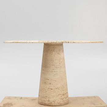 A travertine dining table, late 20th century.