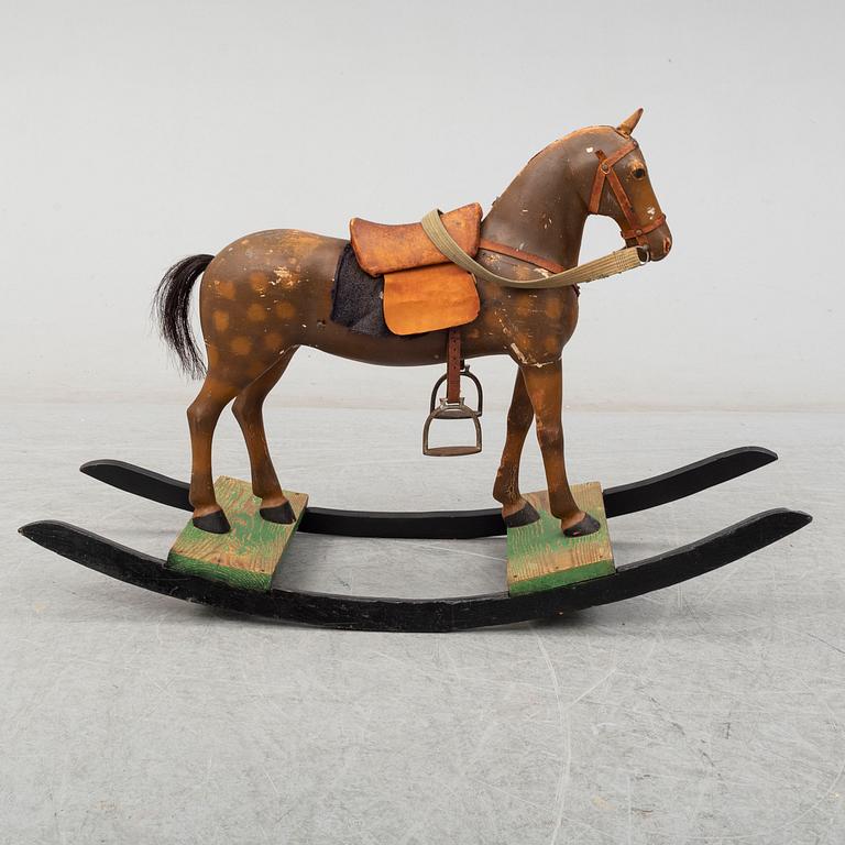 A first half of the 20th century wooden rocking horse.