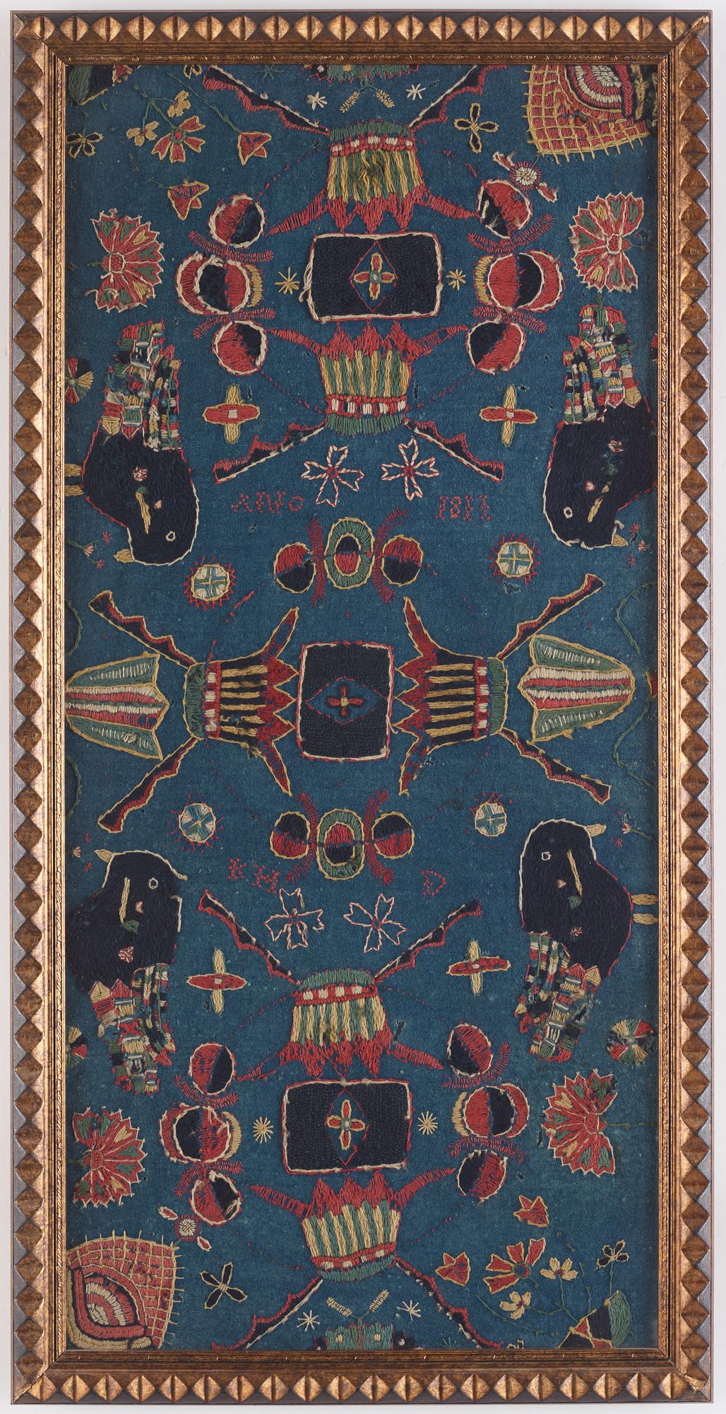 Inramad åkdyna, broderad, ca 93,5 x 43 cm, signerad AMA, Skåne, daterad 1811.