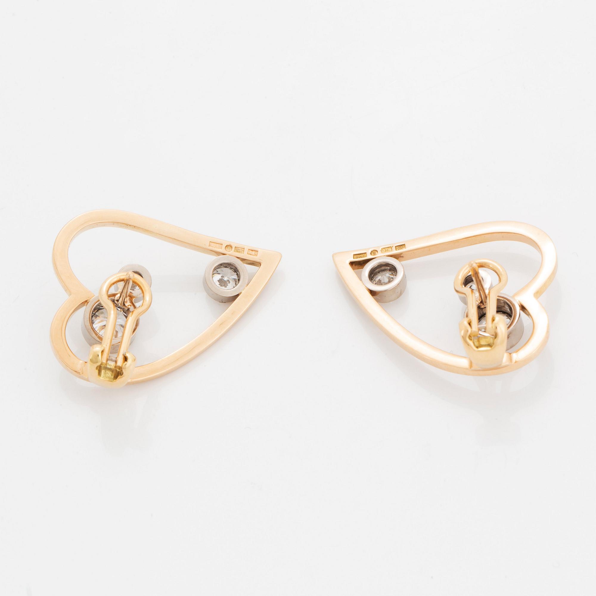 WA Bolin a pair of earrings in 18K gold and white gold set with round brilliant-cut diamonds.