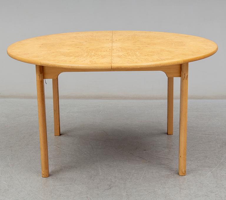 a 'Svitjod' dining table by Göran Malmvall for Karl Andersson & söner.