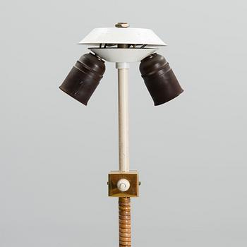 PAAVO TYNELL, A FLOOR LAMP. Made by Idman, 1940-/50s.