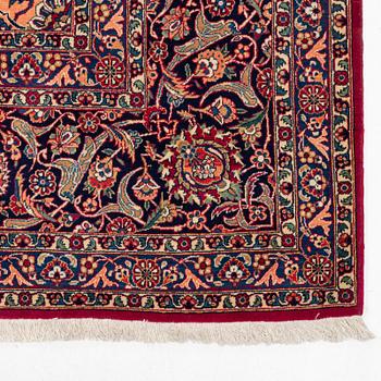 A semi-antique Kashan carpet, c 435 x 325 cm.