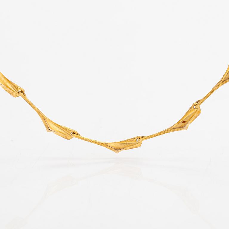 Björn Weckström, A 14K gold necklace "Shadow of a Convoy". Lapponia 1974.