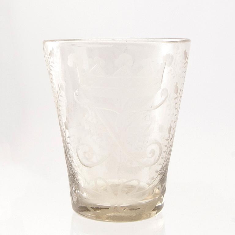 A Swedish glass beaker with the monogram of King Fredrik I, Henrikstorps glass manufactory, early 18th century.