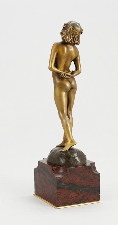 A Joé Decomps patinated bronze figure of a woman, first half of 19th century, signed.