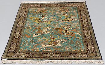 A RUG, an old silk Qum figural, ca 154,5 x 107,5 cm.
