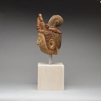 A wooden scultpure of the head of Guanyin, Ming style.