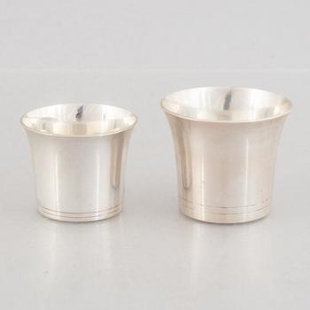 A set of sixteen Swedish silver cups, marks of K. Torndals Juvelerare AB, Stockholm 1955-1962.