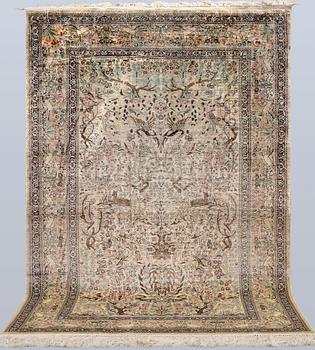 A Oriental silk carpet, 152 x 94 cm.