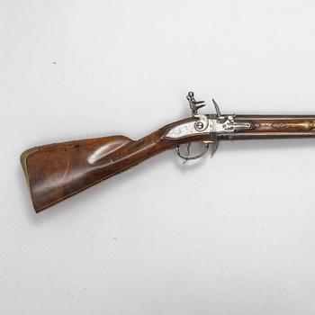 Flintlock rifle, double-barrel "wender" by Philippe de Sellier (1676-1740).