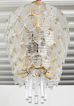 GUNNAR CYRÉN, a glass and gilt bronze chandelier, Orrefors, Sweden 1960's.