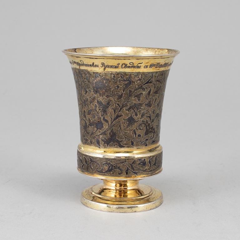 A Russian mid 19th century silver-gilt and niello beaker, unidentified makers mark, Moscow 1845.