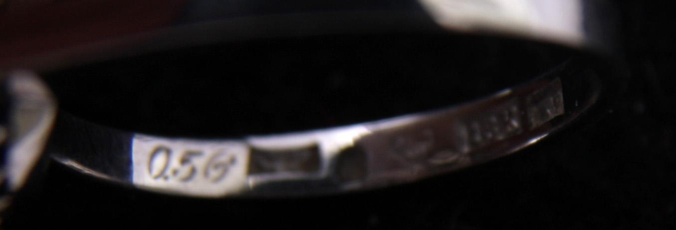 RING, vitguld 18 K med 8+1 diamanter, tot 0,56 ct enl gravyr.
