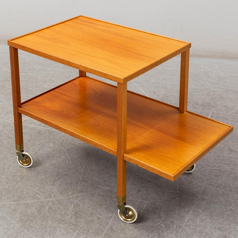 JOSEF FRANK, a model 470 walnut tea trolley for Svenskt Tenn, Sweden.