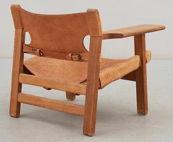 A Børge Mogensen oak and leather 'Spanish Chair' by Fredericia Stolefabrik, Denmark.