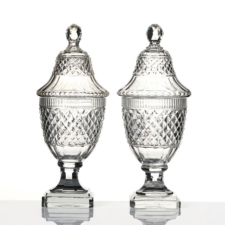 A set of two cut glass jars with covers, Anglo/Irish, 19th Century.