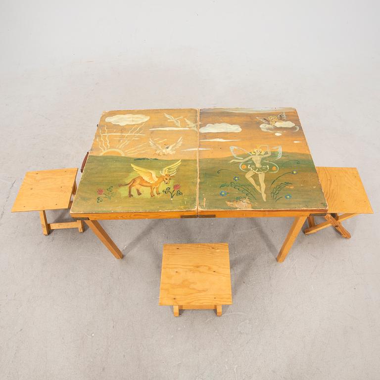 A portable picknick table and stools mid 1900s.