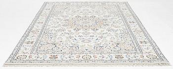 A Nain carpet, approx. 305 x 193 cm.