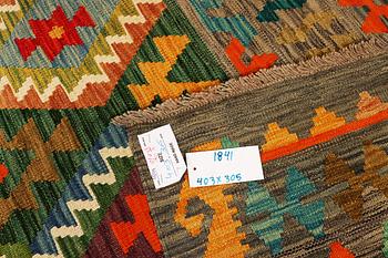 A Kilim carpet, c. 403 x 305 cm.