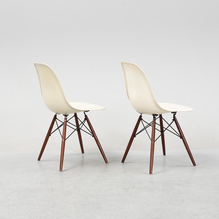 A set of six Plastic Chairs DSW with later stands, by Charles and Ray Eames.