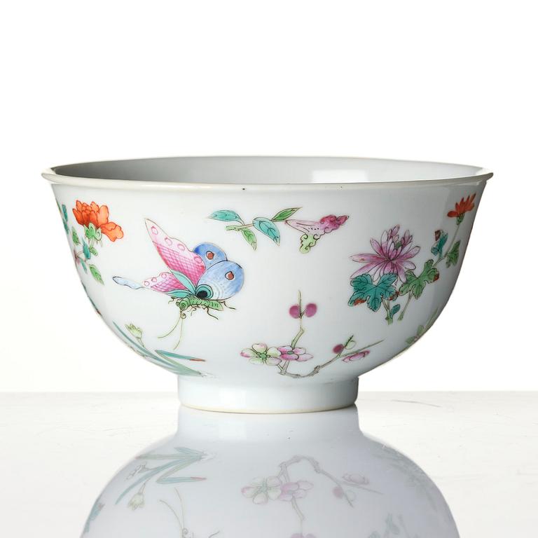 A famille rose 'butterfly' bowl, Qing dynasty with Daoguang mark and of the period (1820-1850).