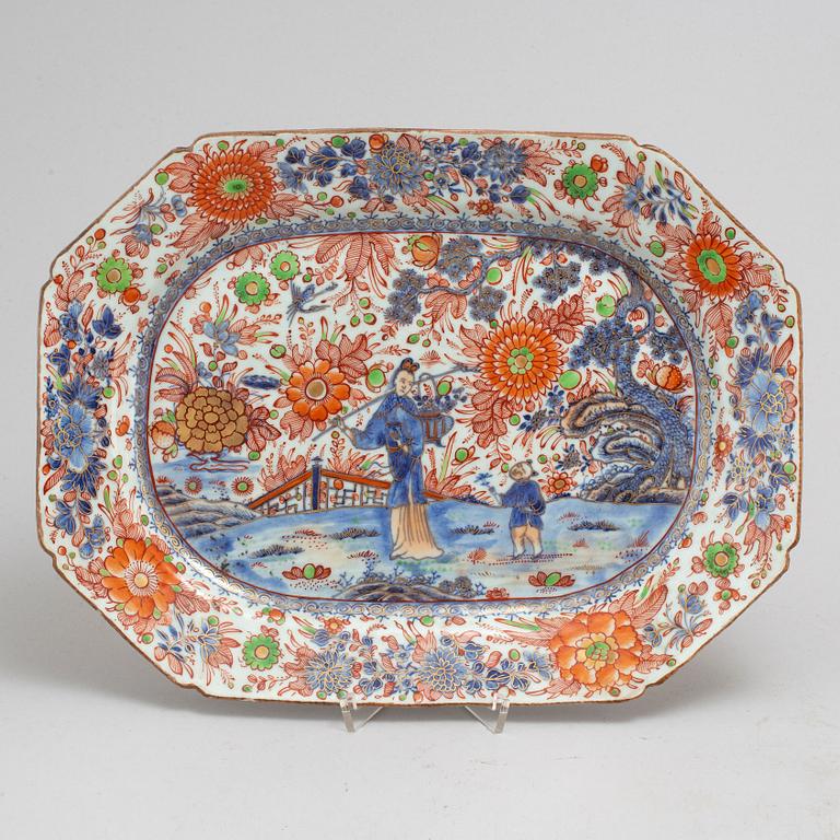 A 'clobbered' blue and white serving dishes, Qing dynasty, Qianlong (1736-95).