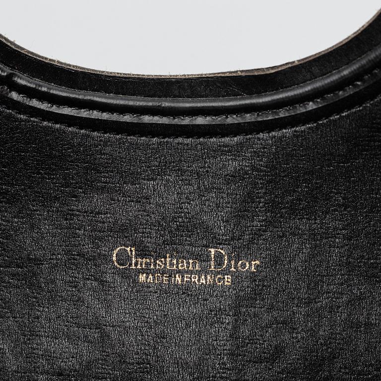Christian Dior, Oblique fold-over convertible clutch.