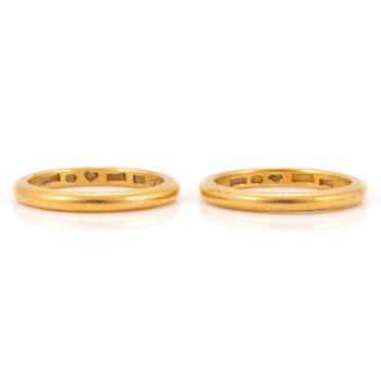 Two 23K gold rings.