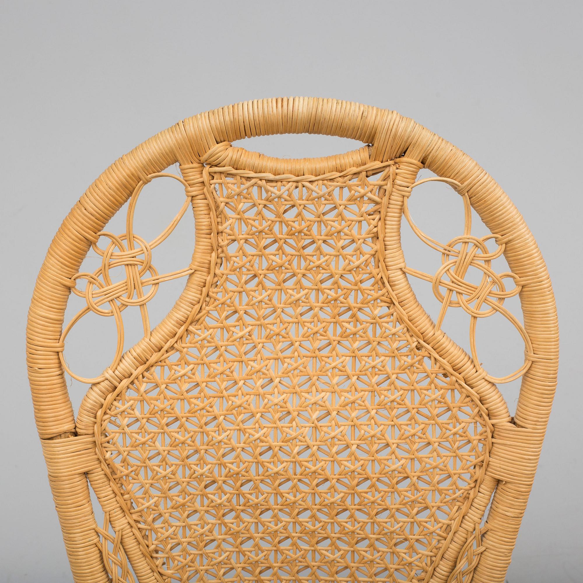 A pair of second half of the 20th cnetury rattan chairs.