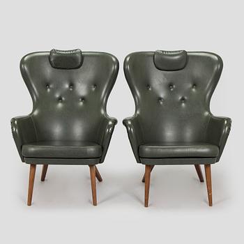 A pair of mid-20th century armchairs.