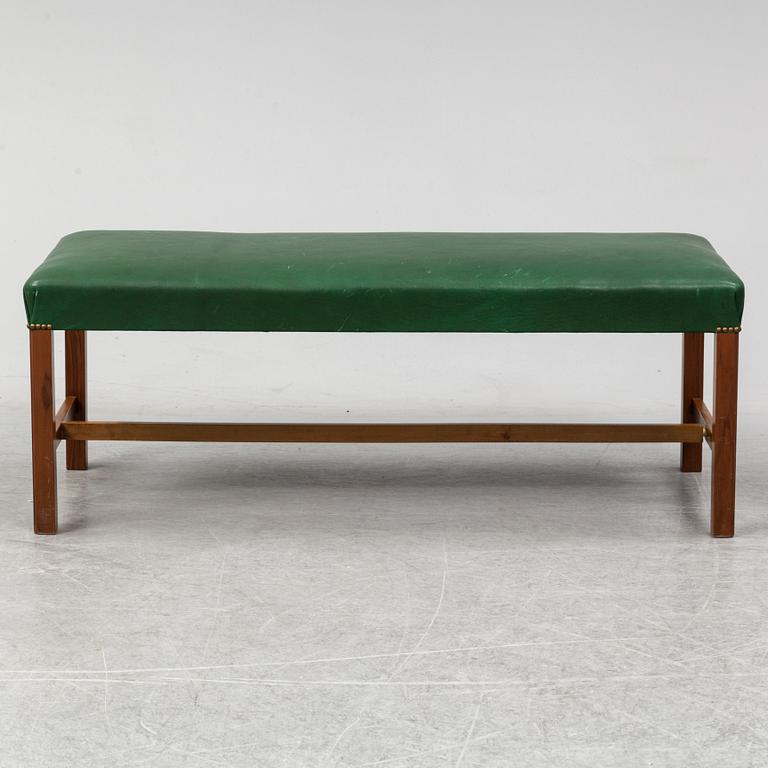 A bench "2082" by Josef Frank for Firma Svenskt Tenn.