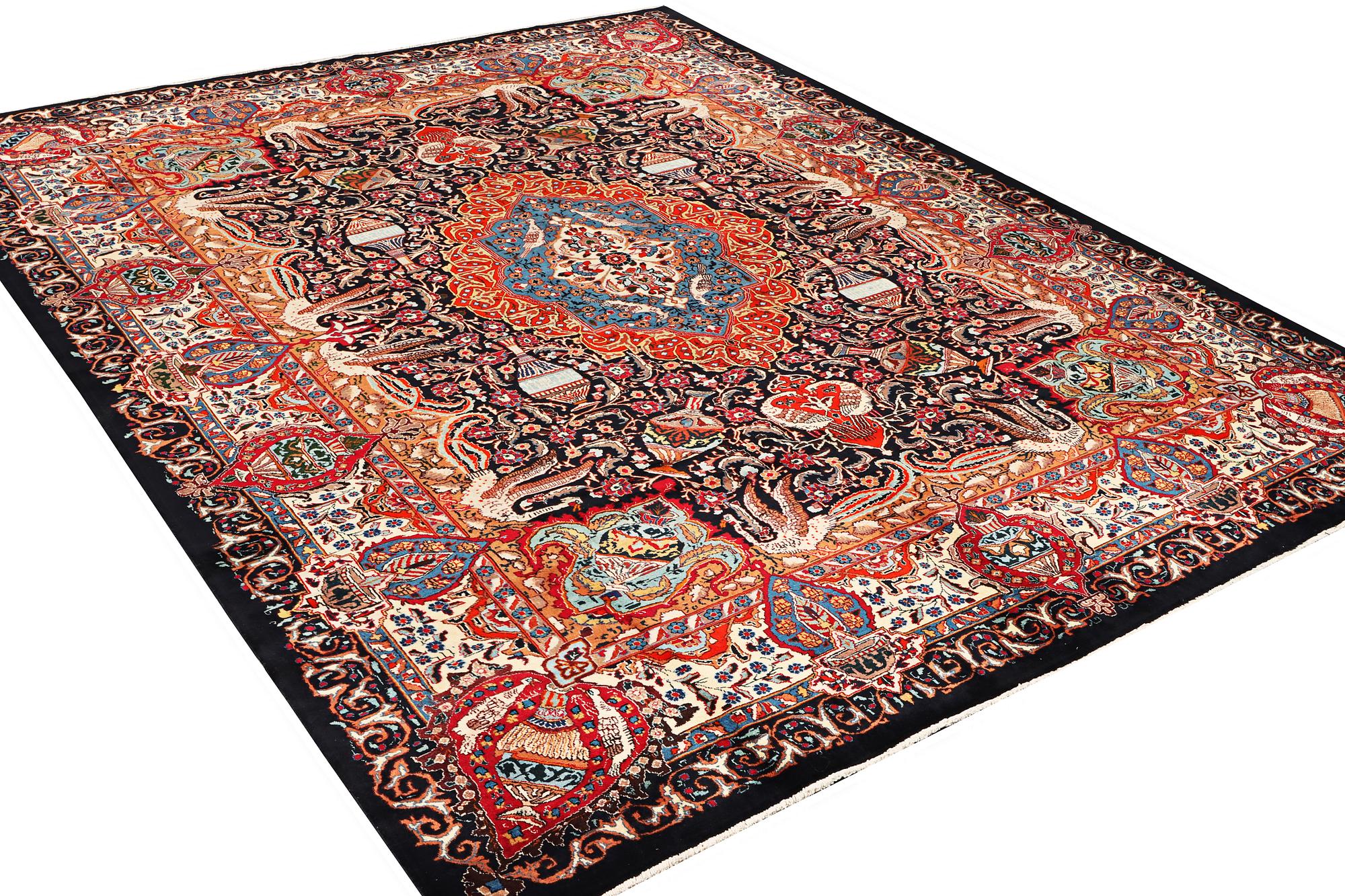 A Kashmir carpet, a. 390 x 305 cm.