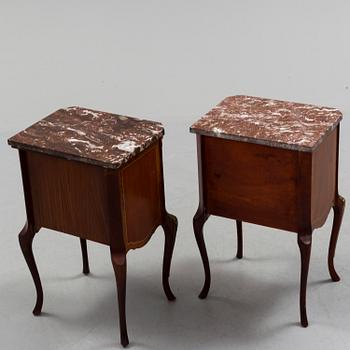 A pair of mid 20 th century mahogany bedside tables.