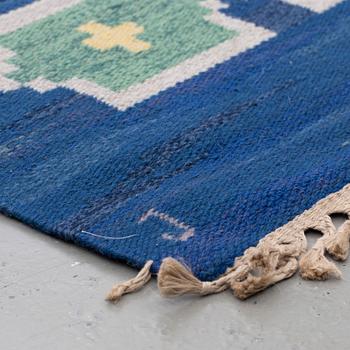 A CARPET, "Stjärnsund", flat weave, signed J (Judith Johansson), around 258 x 167 cm.
