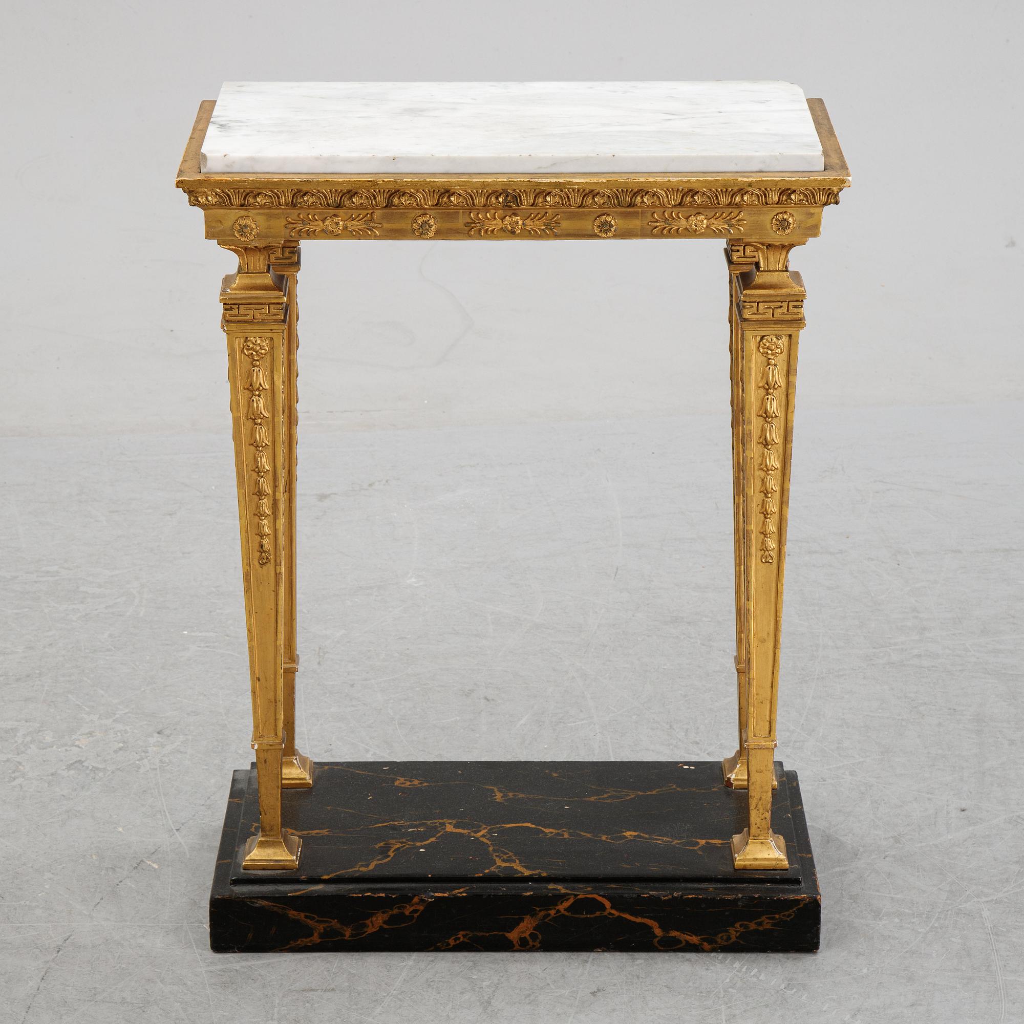 An early 19th Century console table.