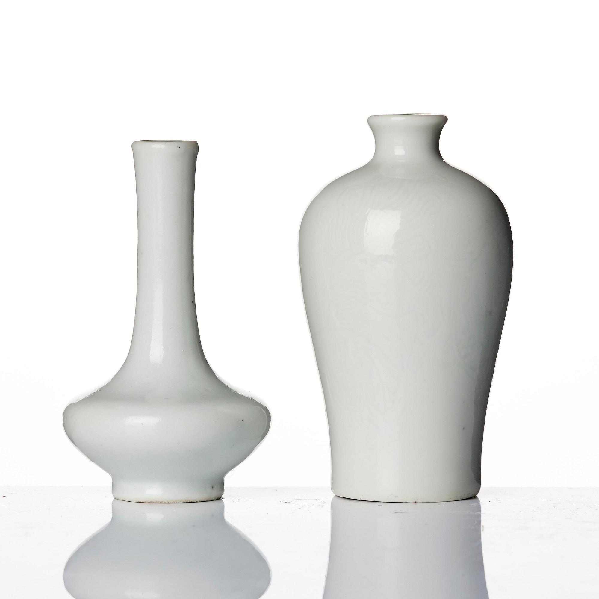 A pair of white glazed vases, Qing dynasty, 18th century.