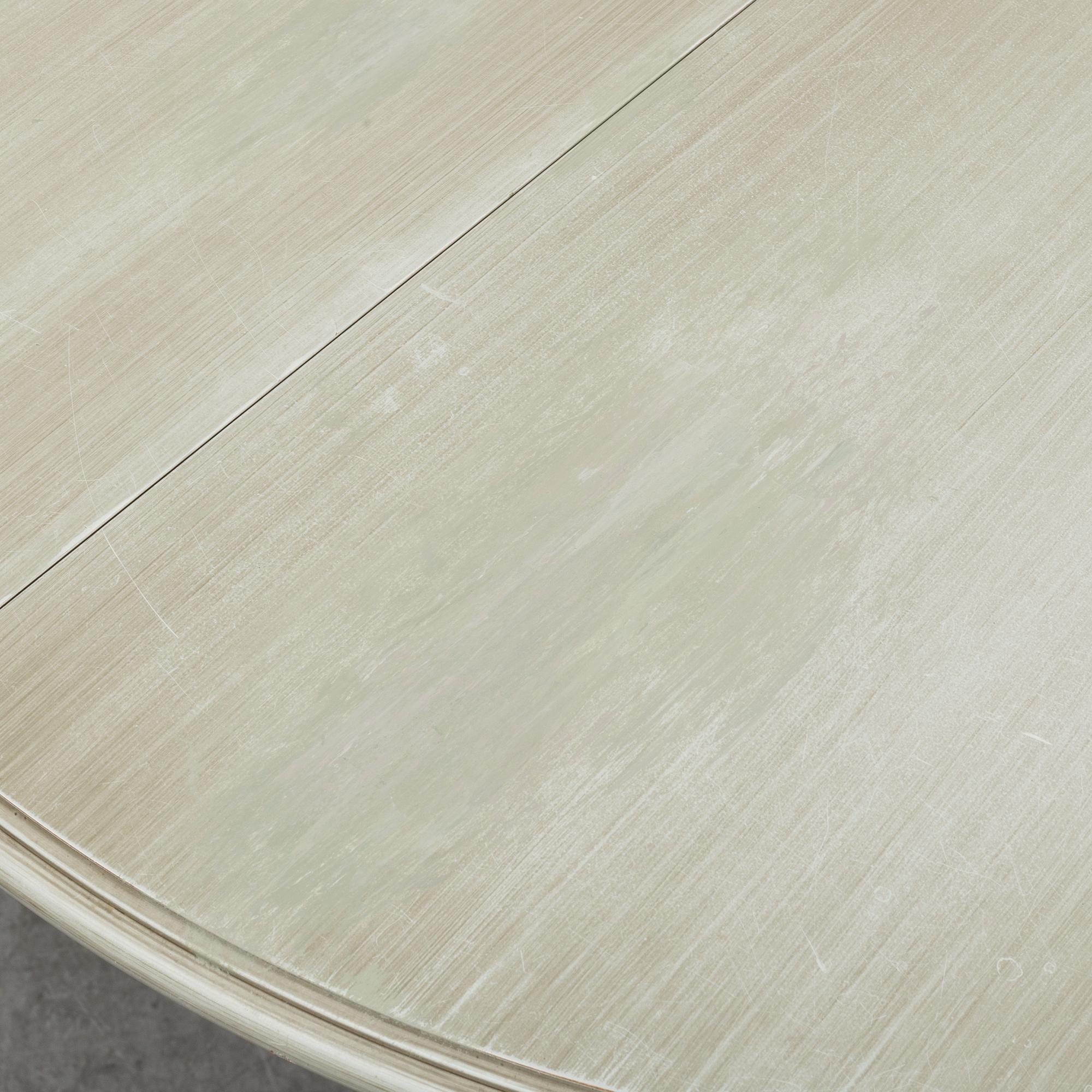 A dining table and six chairs, Gustavian style, second half of the 20th century. One leaf included.