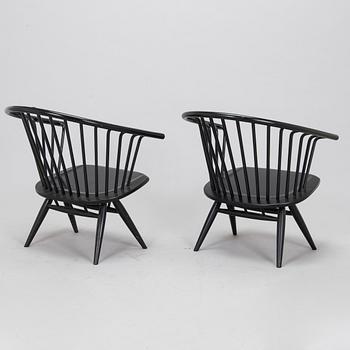Ilmari Tapiovaara, a pair of 1960s 'Crinolette' chairs, Asko, Finland.