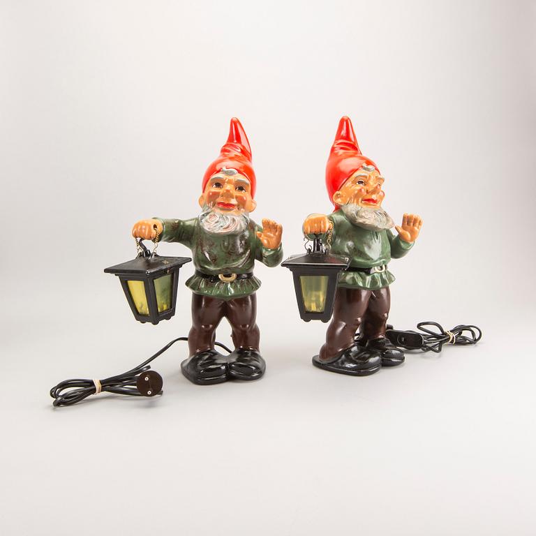 A set of two painted terracotta Heissner gnomes later part of the 20th century.