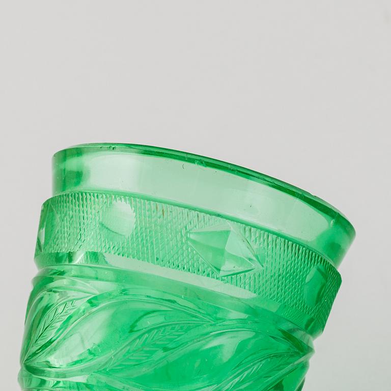 A green tinted cut vodka glass, Russia, Imperial glass manufactory, St Petersburg, 19th Century.