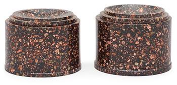 654. A Swedish 19th century porphyry set with inkwell and sand holder.