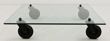 A Gae Aulenti 'Tavola con Ruote' table, Fontana Arte, Italy.