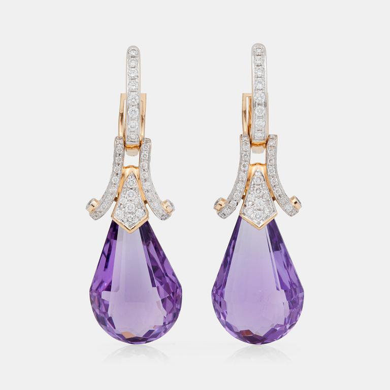 A pair of amethyst, circa 36 cts, and diamond earring.