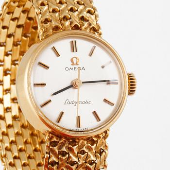 ARMBANDSUR, dam, guld, "Ladymatic" Omega. Total vikt 39 g.